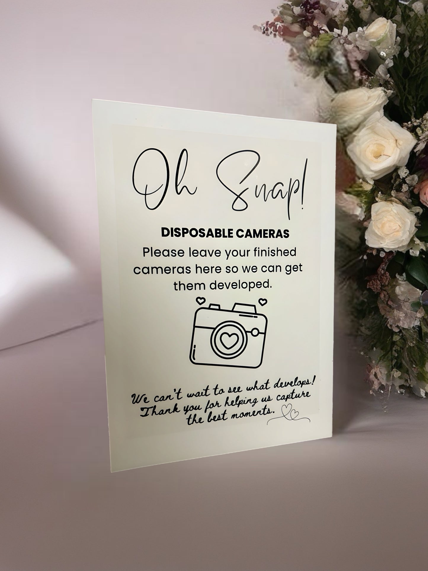 Free standing card to guide disposable camera collection